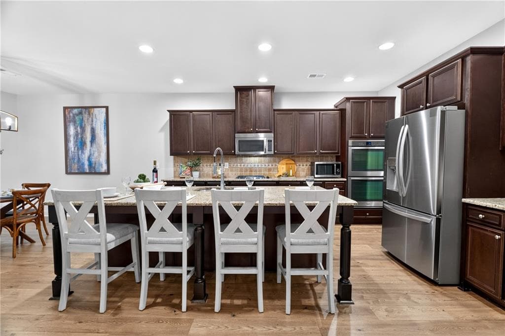 4 bedroom, 4 bathroom, 3,266 sq ft single family residence for sale at 3980 Sweeting Street, Cumming, GA 30041 — photo 8