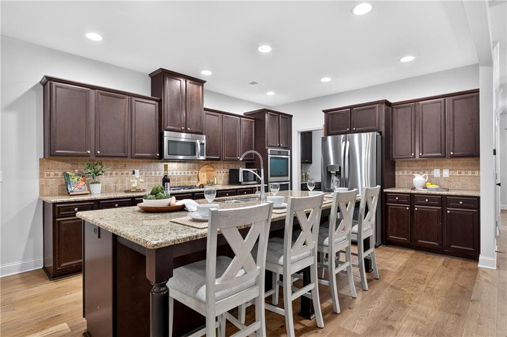4 bedroom, 4 bathroom, 3,266 sq ft single family residence for sale at 3980 Sweeting Street, Cumming, GA 30041 — photo 6
