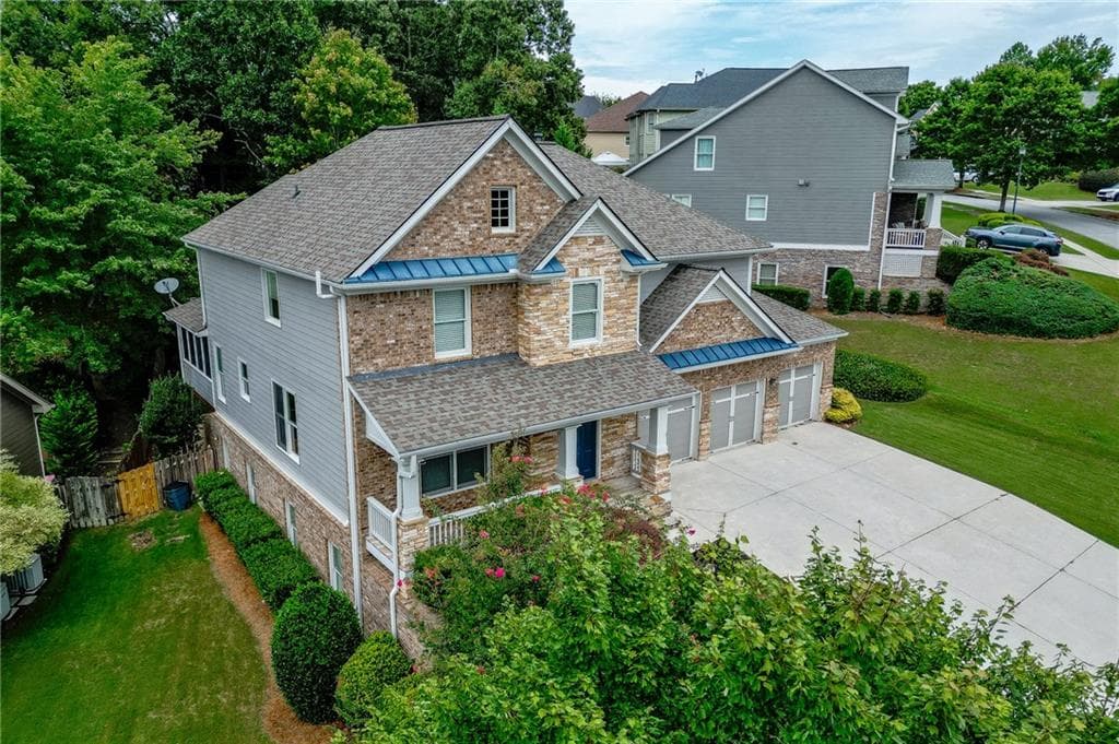 7 bedroom, 6 bathroom, 5,086 sq ft single family residence for sale at 7563 Brookstone Circle, Flowery Branch, GA 30542 — photo 3