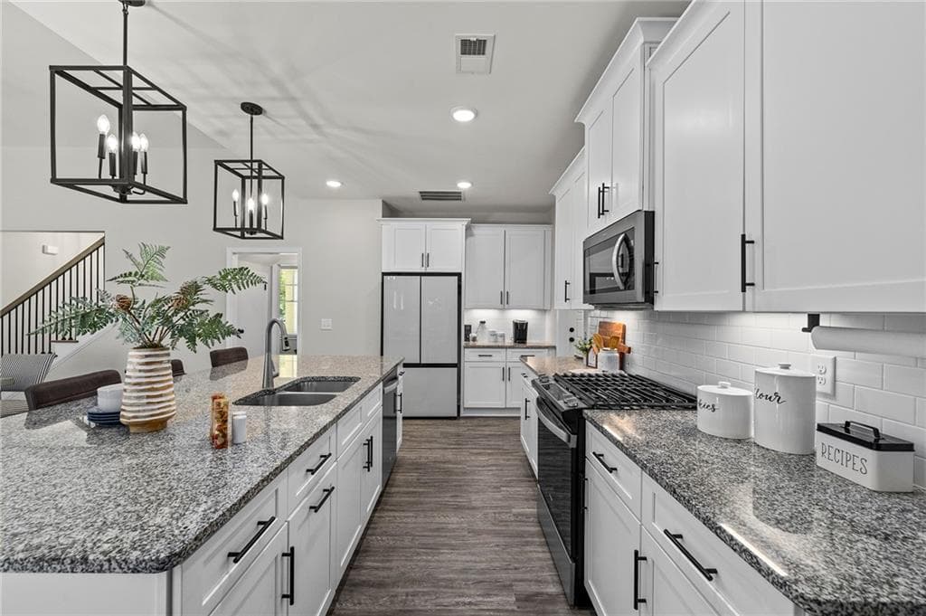 4 bedroom, 3 bathroom, 2,479 sq ft single family residence for sale at 202 Jefferson Avenue, Canton, GA 30114 — photo 2