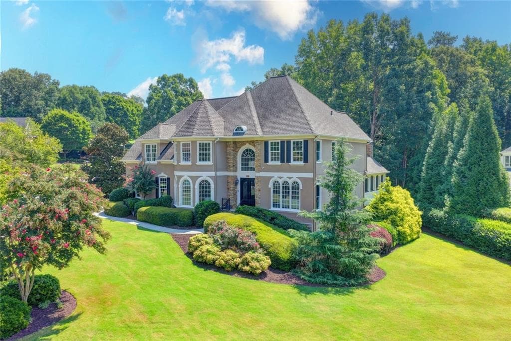 6 bedroom, 5 bathroom, 6,842 sq ft single family residence for sale at 4105 Falls Ridge Drive, Johns Creek, GA 30022
