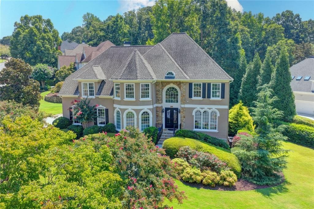 6 bedroom, 5 bathroom, 6,842 sq ft single family residence for sale at 4105 Falls Ridge Drive, Johns Creek, GA 30022 — photo 2