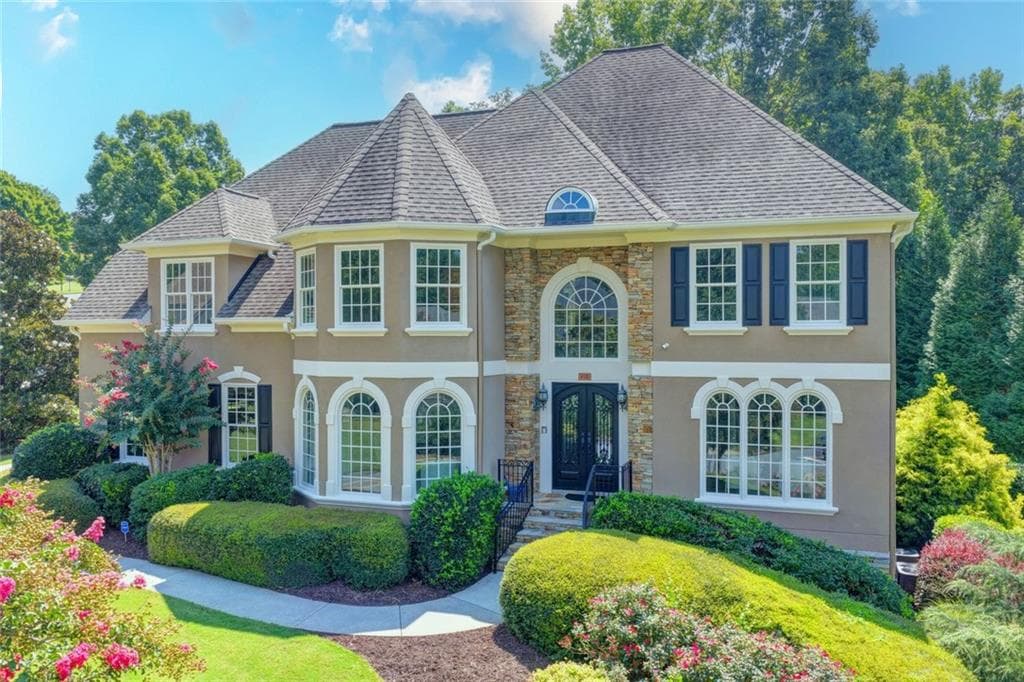 6 bedroom, 5 bathroom, 6,842 sq ft single family residence for sale at 4105 Falls Ridge Drive, Johns Creek, GA 30022 — photo 3