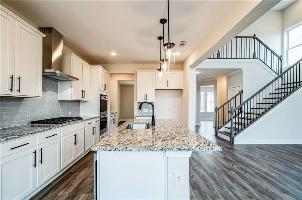 4 bedroom, 4 bathroom, 2,677 sq ft single family residence for sale at 5374 Ridgetop Trail, Sugar Hill, GA 30518 — photo 7