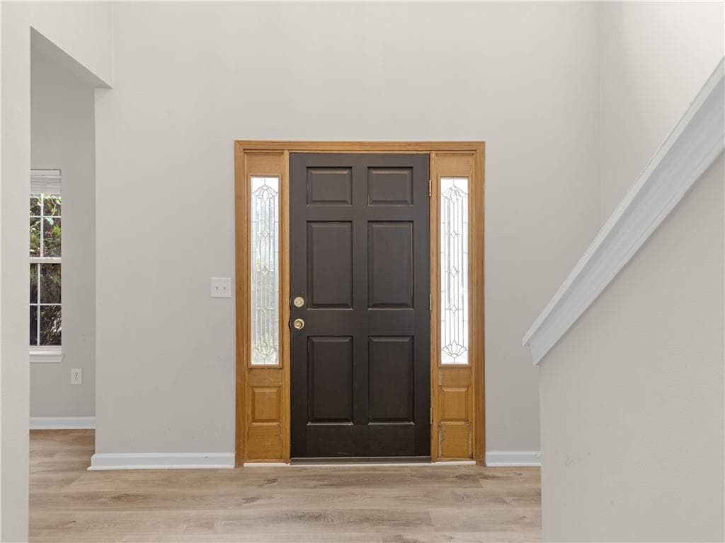 4 bedroom, 3 bathroom, 2,114 sq ft single family residence for sale at 11704 Spring Lake Way, Fayetteville, GA 30215 — photo 2