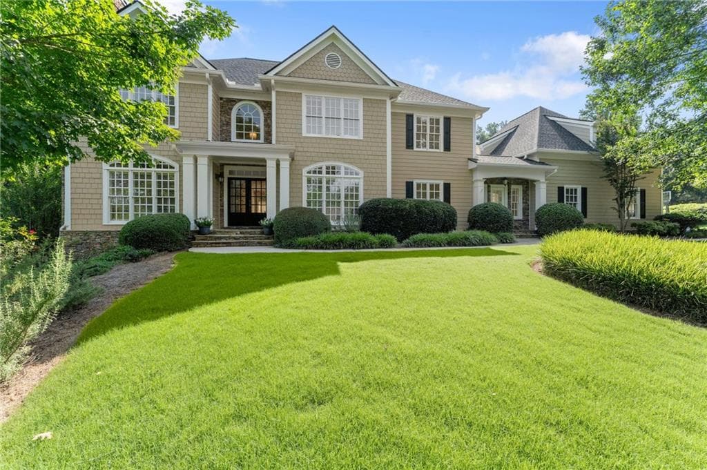6 bedroom, 5 bathroom, 4,196 sq ft single family residence for sale at 5050 Fenwick Drive, Cumming, GA 30040 — photo 2