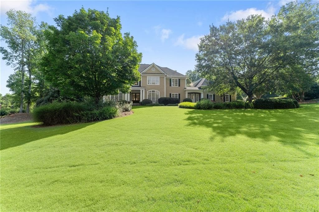 6 bedroom, 5 bathroom, 4,196 sq ft single family residence for sale at 5050 Fenwick Drive, Cumming, GA 30040