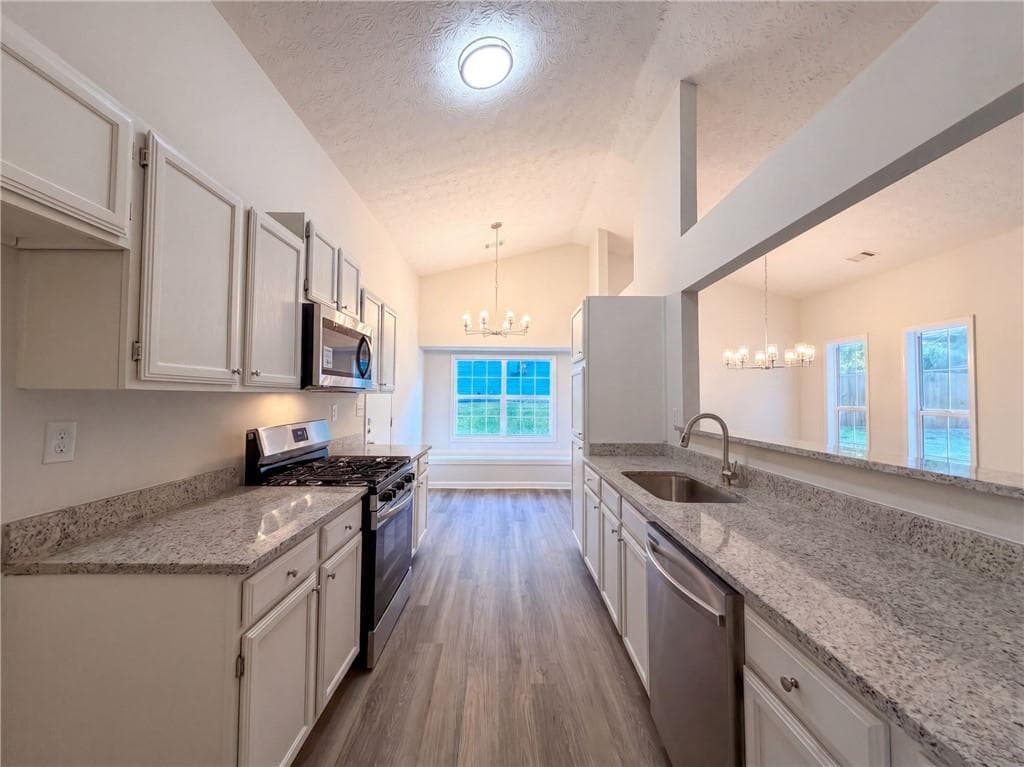 3 bedroom, 2 bathroom, 1,400 sq ft single family residence for sale at 5857 Mistyview Drive, Rex, GA 30273 — photo 2