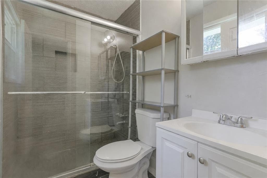 5 bedroom, 3 bathroom, 1,592 sq ft single family residence for sale at 1563 Greenwood Drive, Norcross, GA 30093 — photo 8