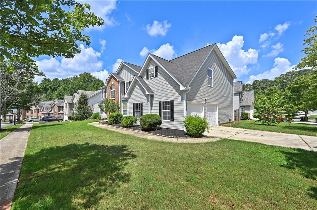 4 bedroom, 3 bathroom, 3,009 sq ft single family residence for sale at 4201 Ash Tree Street, Snellville, GA 30039 — photo 2
