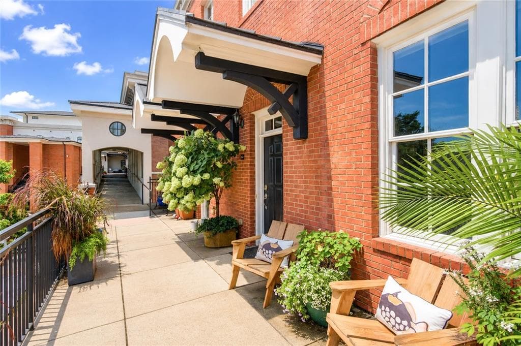 2 bedroom, 3 bathroom, 2,080 sq ft condominium for sale at 3930 Charleston Market Street 218, Suwanee, GA 30024 — photo 1 of 22