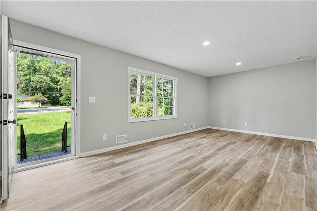 4 bedroom, 3 bathroom, 1,776 sq ft single family residence for sale at 6200 Auburn Drive, Riverdale, GA 30296 — photo 6