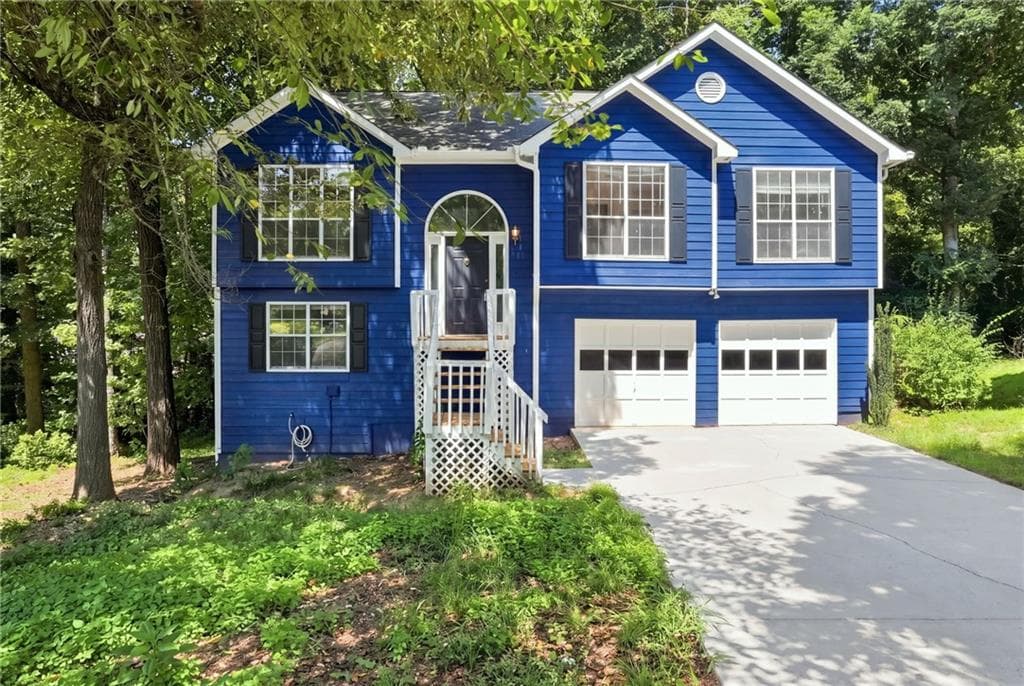 4 bedroom, 3 bathroom, 2,165 sq ft single family residence for sale at 6715 Dogwood Point Lane, Tucker, GA 30084 — photo 2