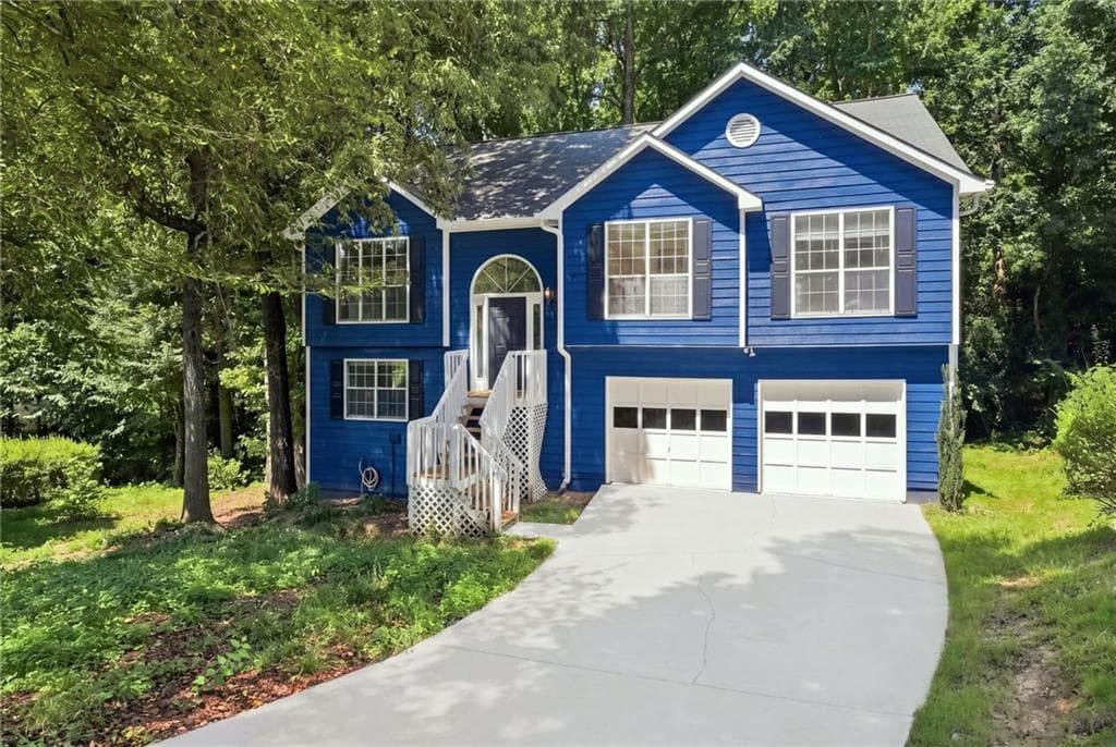 4 bedroom, 3 bathroom, 2,165 sq ft single family residence for sale at 6715 Dogwood Point Lane, Tucker, GA 30084