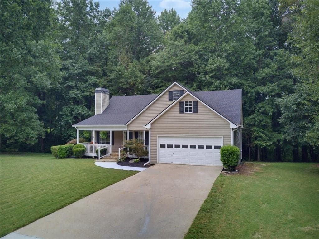 4 bedroom, 3 bathroom, 2,530 sq ft single family residence for sale at 7425 Hickory Bluff Drive, Cumming, GA 30040 — photo 2