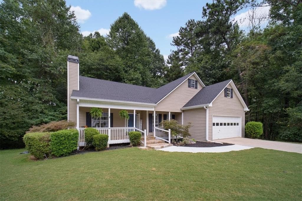 4 bedroom, 3 bathroom, 2,530 sq ft single family residence for sale at 7425 Hickory Bluff Drive, Cumming, GA 30040 — photo 1 of 63