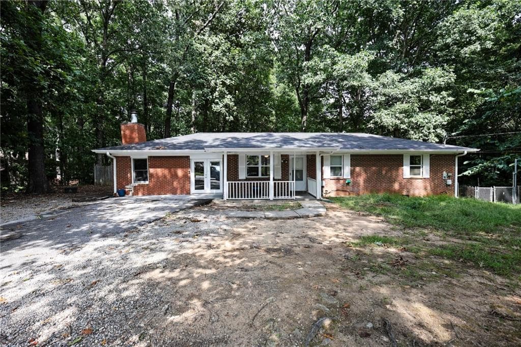 3 bedroom, 2 bathroom, 1,536 sq ft single family residence for sale at 4330 Mink Livsey Road, Snellville, GA 30039 — photo 1 of 33