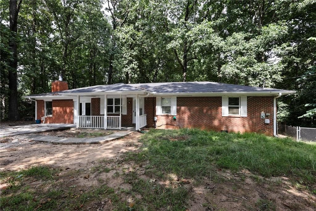 3 bedroom, 2 bathroom, 1,536 sq ft single family residence for sale at 4330 Mink Livsey Road, Snellville, GA 30039 — photo 2