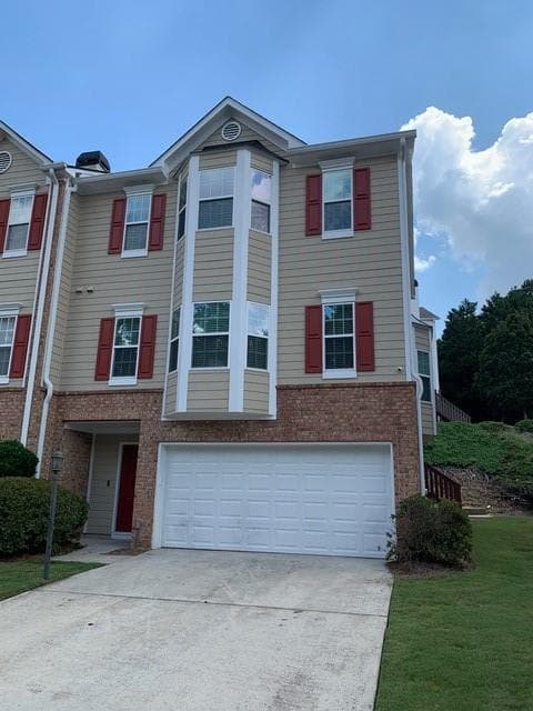 3 bedroom, 3 bathroom, 2,024 sq ft townhouse for sale at 5985 Eagle Tiff Lane, Sugar Hill, GA 30518 — photo 1 of 42