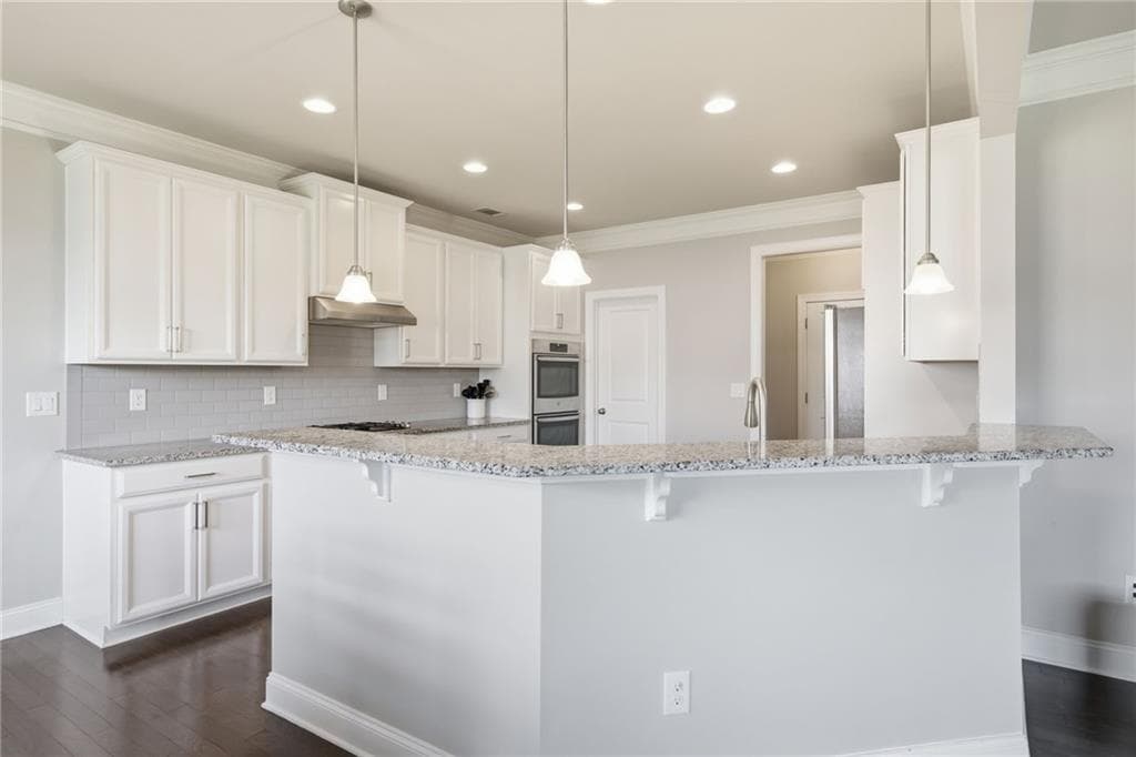 4 bedroom, 3 bathroom, 4,352 sq ft single family residence for sale at 2050 Poplar Ridge Place, Cumming, GA 30040 — photo 2