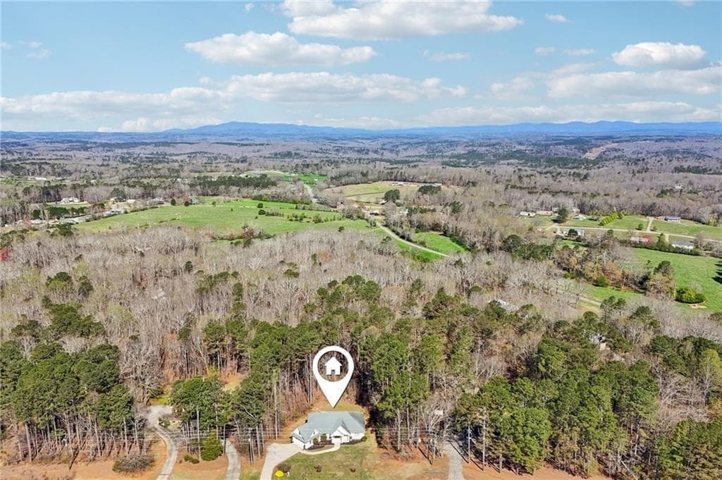 4 bedroom, 3 bathroom, 2,582 sq ft single family residence for sale at 7055 Bannister Road, Cumming, GA 30028 — photo 3