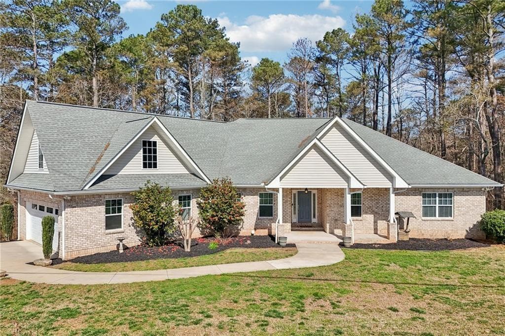 4 bedroom, 3 bathroom, 2,582 sq ft single family residence for sale at 7055 Bannister Road, Cumming, GA 30028 — photo 5