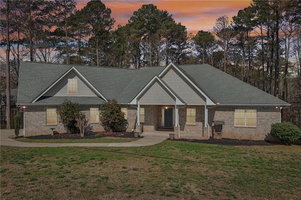 4 bedroom, 3 bathroom, 2,582 sq ft single family residence for sale at 7055 Bannister Road, Cumming, GA 30028 — photo 1 of 50