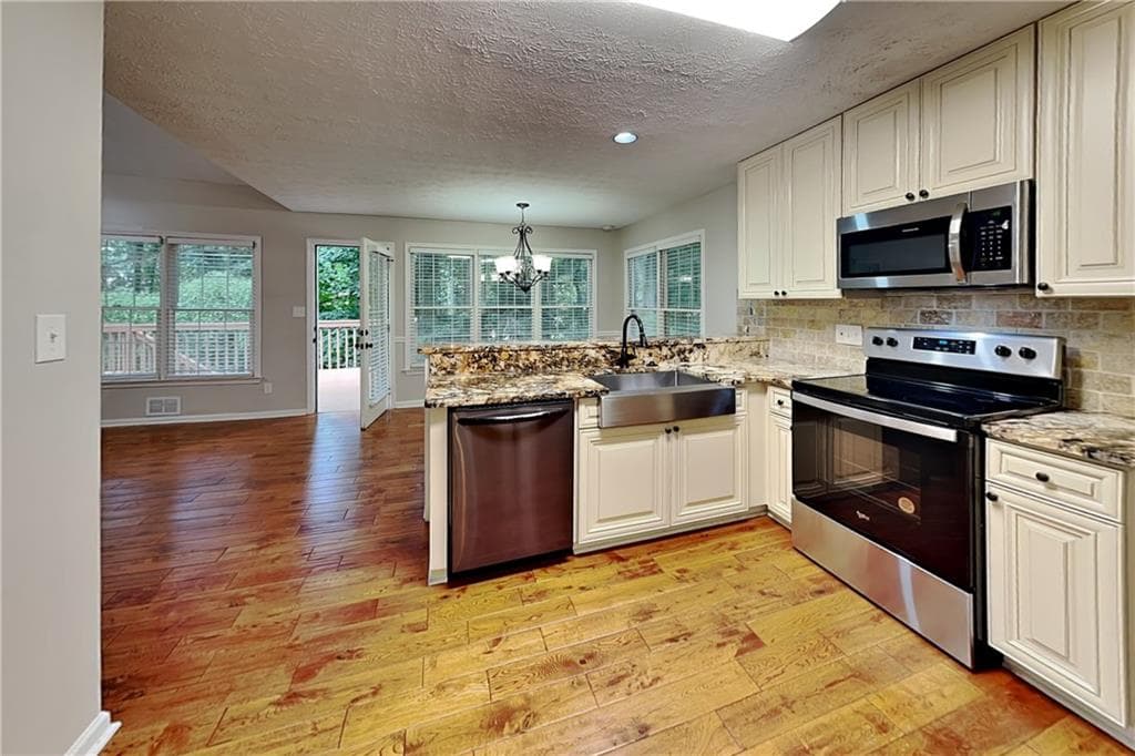 4 bedroom, 3 bathroom, 2,893 sq ft single family residence for rent at 772 Rockfount Way, Lawrenceville, GA 30043 for $2,590 a month — photo 2