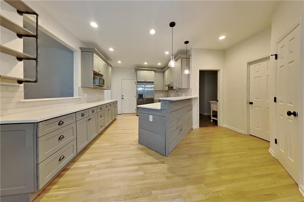 4 bedroom, 4 bathroom, 2,969 sq ft single family residence for rent at 1025 Russell Point, Suwanee, GA 30024 for $3,675 a month — photo 4