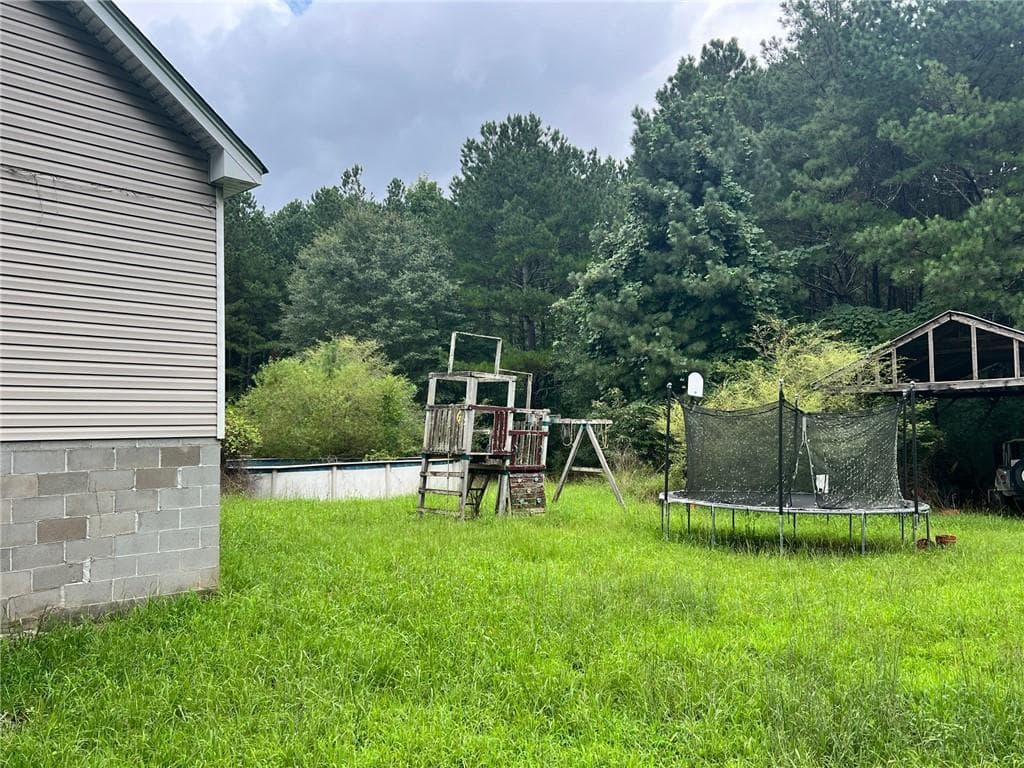 4 bedroom, 2 bathroom, 2,033 sq ft single family residence for sale at 1383 Sims Road, Winder, GA 30680 — photo 4