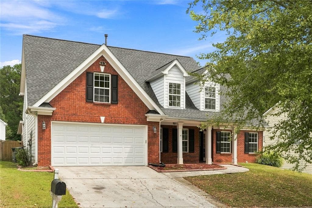 4 bedroom, 3 bathroom, 2,274 sq ft single family residence for sale at 4120 Savannah Ridge Trace, Loganville, GA 30052 — photo 2