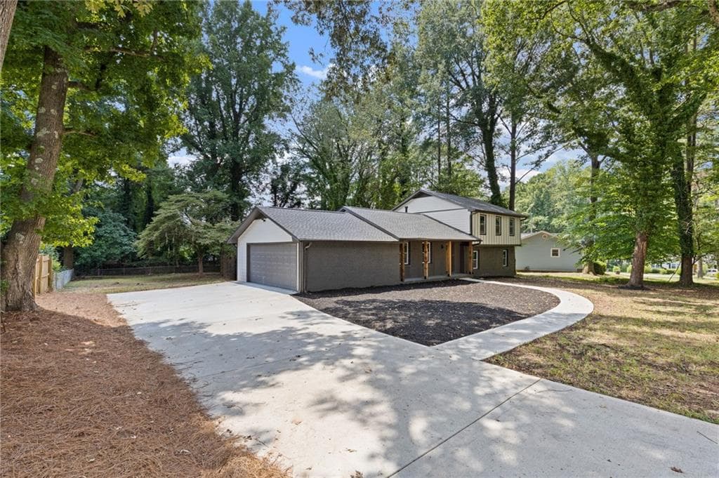 4 bedroom, 3 bathroom, 2,055 sq ft single family residence for sale at 2176 Deer Trail, Suwanee, GA 30024 — photo 2