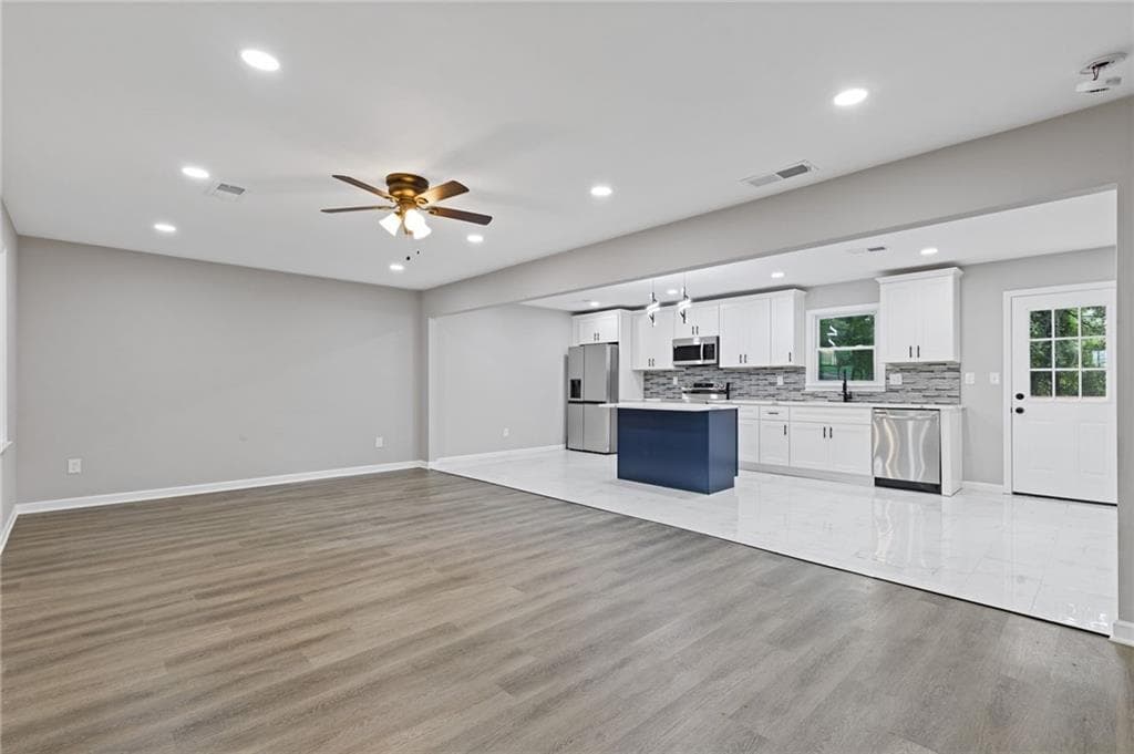 4 bedroom, 3 bathroom, 2,055 sq ft single family residence for sale at 2176 Deer Trail, Suwanee, GA 30024 — photo 4