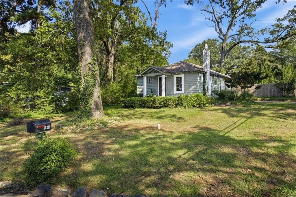 3 bedroom, 2 bathroom, 1,038 sq ft single family residence for sale at 1945 NW Baker Road, Atlanta, GA 30318 — photo 2