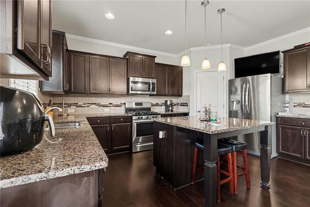 5 bedroom, 4 bathroom, 3,666 sq ft single family residence for sale at 7324 Demeter Drive, Atlanta, GA 30349 — photo 4