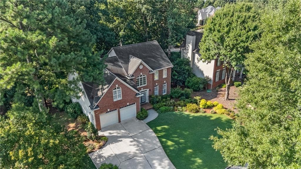 5 bedroom, 4 bathroom, 4,050 sq ft single family residence for sale at 5785 Millwick Drive, Johns Creek, GA 30005 — photo 2