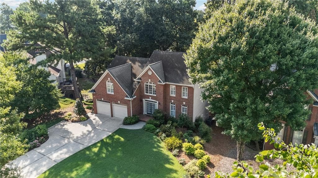 5 bedroom, 4 bathroom, 4,050 sq ft single family residence for sale at 5785 Millwick Drive, Johns Creek, GA 30005 — photo 4