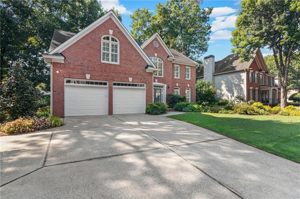 5 bedroom, 4 bathroom, 4,050 sq ft single family residence for sale at 5785 Millwick Drive, Johns Creek, GA 30005 — photo 6