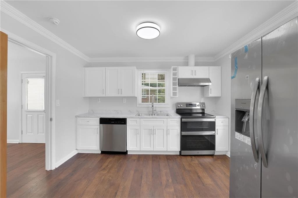 4 bedroom, 2 bathroom, 1,716 sq ft single family residence for sale at 1655 Lucelle Avenue, Stone Mountain, GA 30087 — photo 8