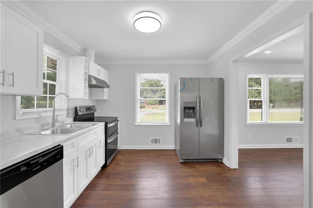 4 bedroom, 2 bathroom, 1,716 sq ft single family residence for sale at 1655 Lucelle Avenue, Stone Mountain, GA 30087 — photo 10