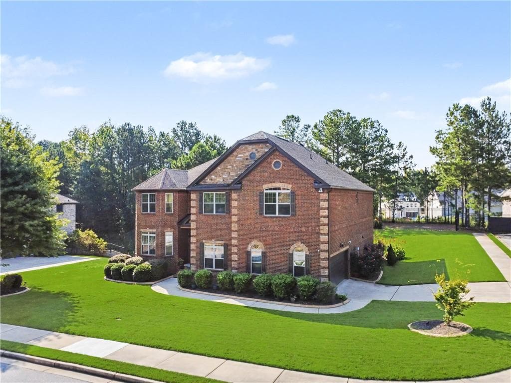 7 bedroom, 5 bathroom, 6,505 sq ft single family residence for sale at 264 Learwood Lane, Atlanta, GA 30349 — photo 2