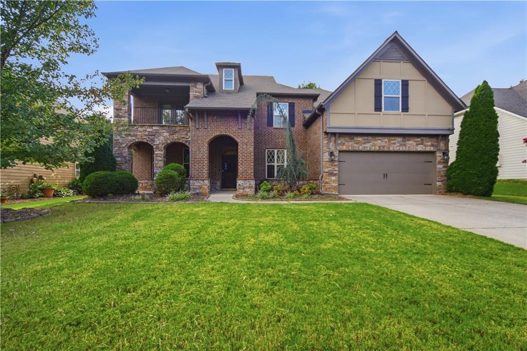 5 bedroom, 4 bathroom, 3,990 sq ft single family residence for sale at 6565 Bentley Ridge Drive, Cumming, GA 30040