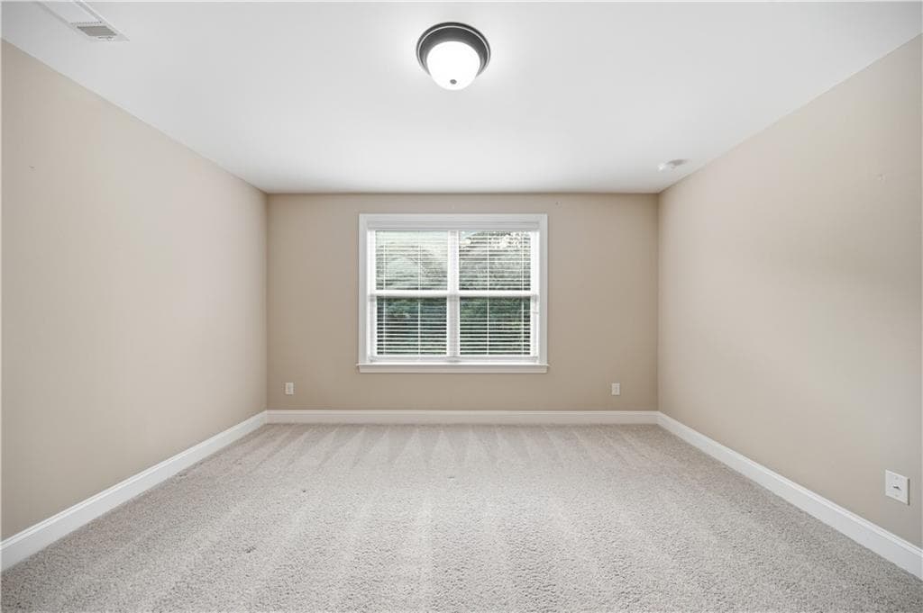 5 bedroom, 4 bathroom, 3,990 sq ft single family residence for sale at 6565 Bentley Ridge Drive, Cumming, GA 30040 — photo 4