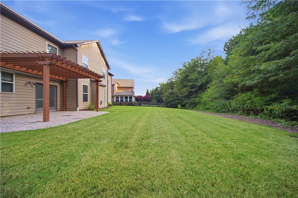 5 bedroom, 4 bathroom, 3,990 sq ft single family residence for sale at 6565 Bentley Ridge Drive, Cumming, GA 30040 — photo 6