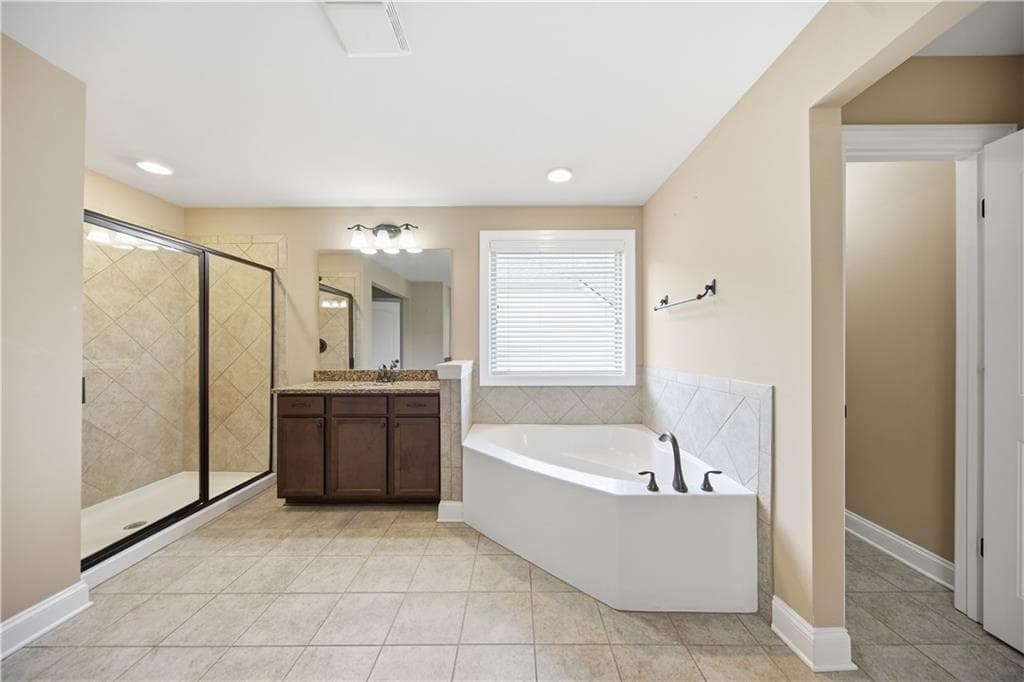 5 bedroom, 4 bathroom, 3,990 sq ft single family residence for sale at 6565 Bentley Ridge Drive, Cumming, GA 30040 — photo 8
