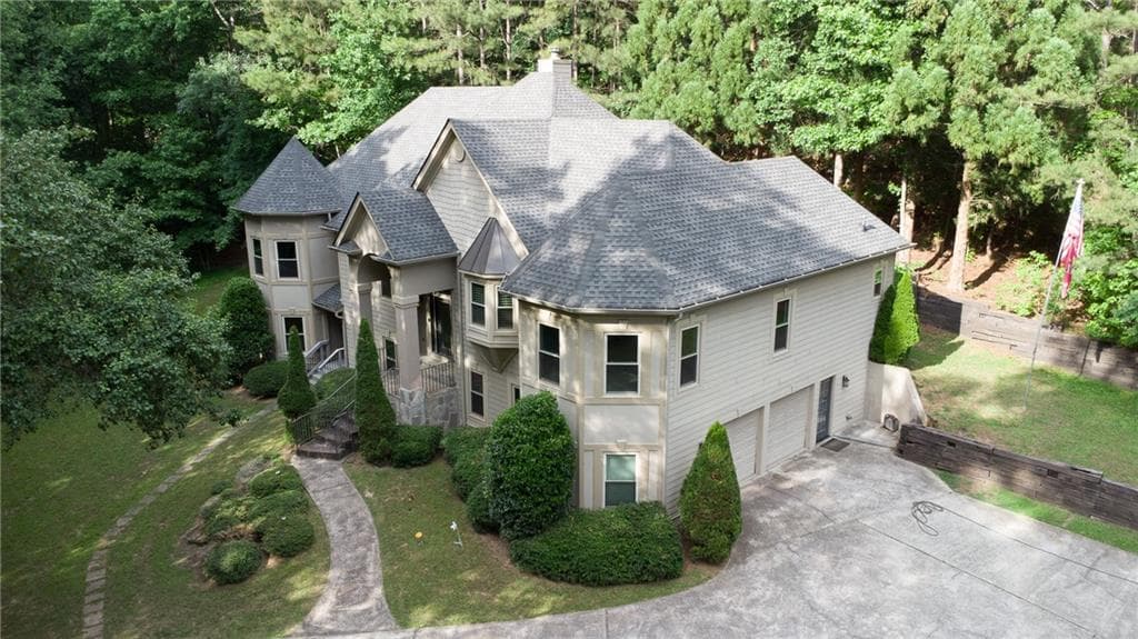 5 bedroom, 3 bathroom, 5,116 sq ft single family residence for sale at 2535 Ashford Drive, Cumming, GA 30041 — photo 2