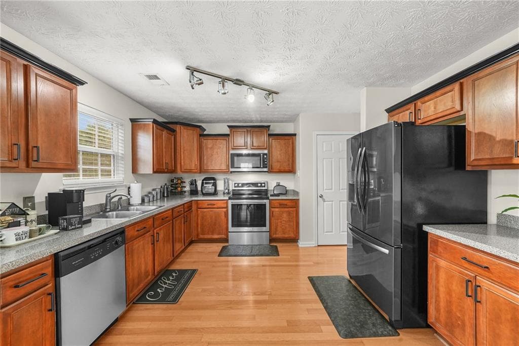 5 bedroom, 3 bathroom, 3,140 sq ft single family residence for sale at 3415 Ashford Loop, Ellenwood, GA 30294 — photo 10