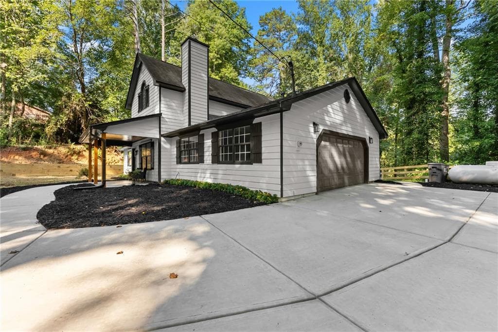 3 bedroom, 2 bathroom, 1,701 sq ft single family residence for sale at 1662 Jimmy Dodd Road, Buford, GA 30518 — photo 2