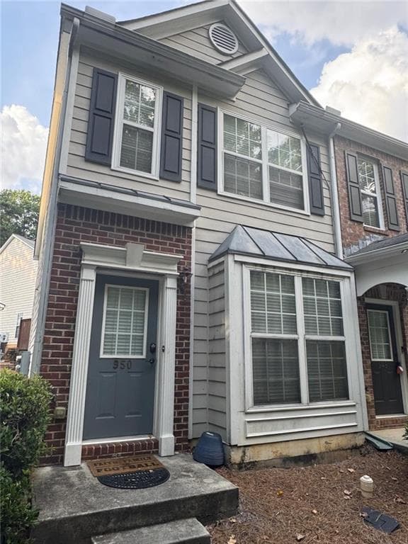 2 bedroom, 3 bathroom, 1,244 sq ft townhouse for rent at 950 Redwood Drive, Norcross, GA 30093 for $1,750 a month — photo 1 of 14