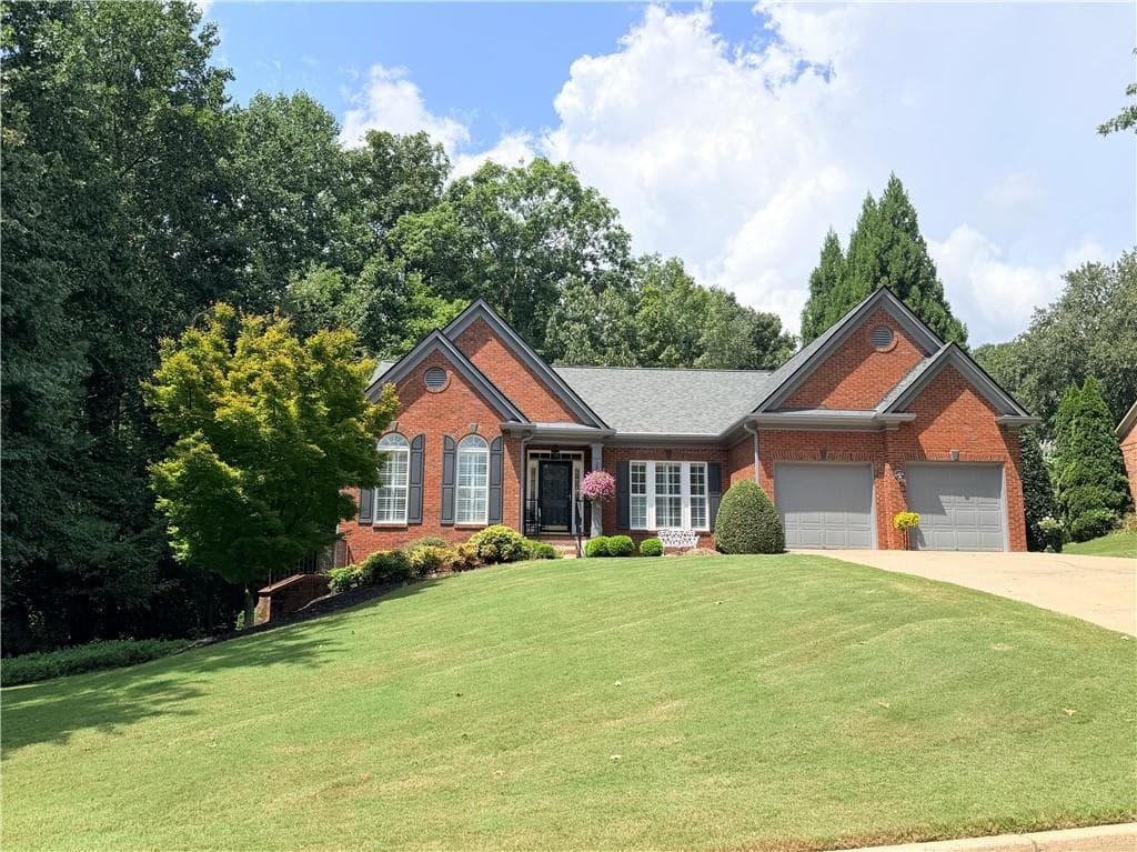 3 bedroom, 3 bathroom, 2,716 sq ft single family residence for sale at 1545 Bookhout Drive, Cumming, GA 30041 — photo 2
